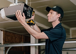PDS worker checking the garage door meter.