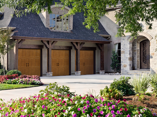 Luxury Triple Garage Doors on Stone House