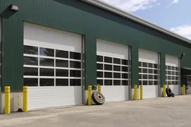 Green service station garage doors.