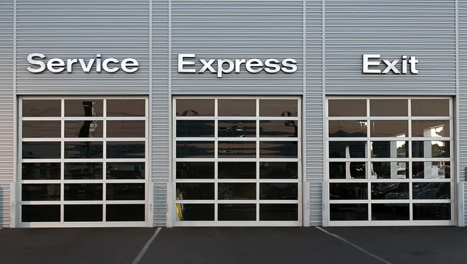 Car dealership service station garage doors.