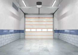 Sectional garage door with operator.