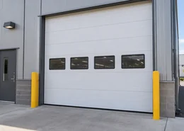 Sectional garage door with windows.