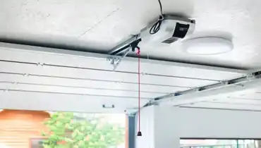 A smart garage door opener in a modern residential garage.