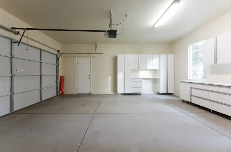 A garage interior with a window allowing natural light to flood into the space. 