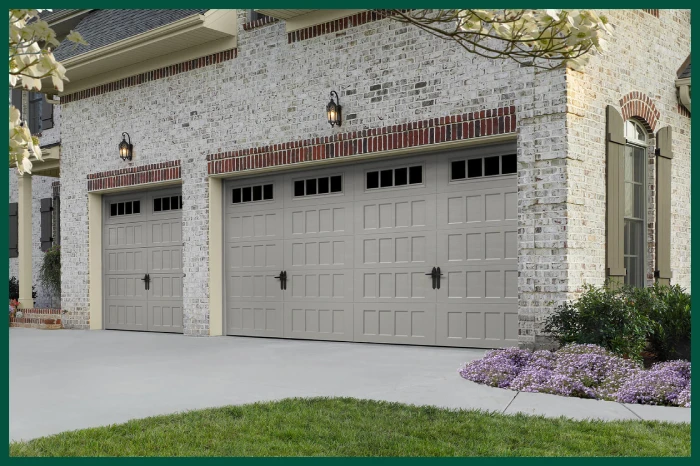 Grey garage door with black hardware.