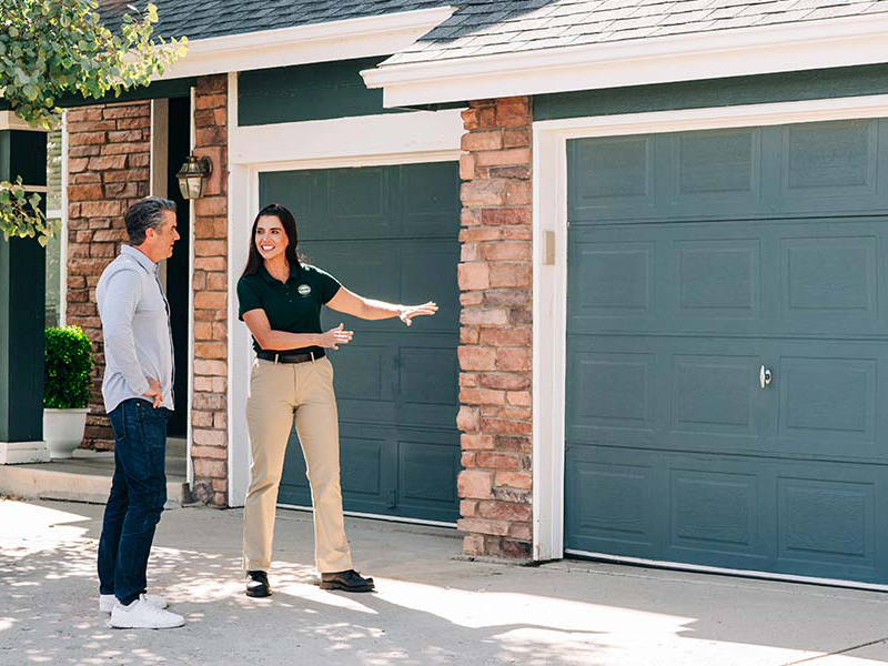 A professional spends his day replacing garage door opener units around town.  
