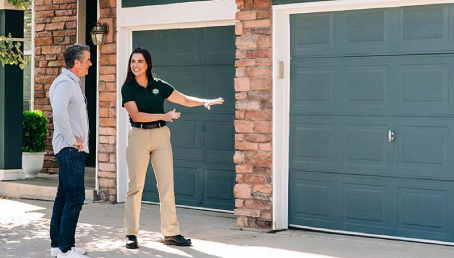 A professional spends his day replacing garage door opener units around town.  